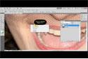 Photoshop çarpıtma özelliği ile vampir dişler
